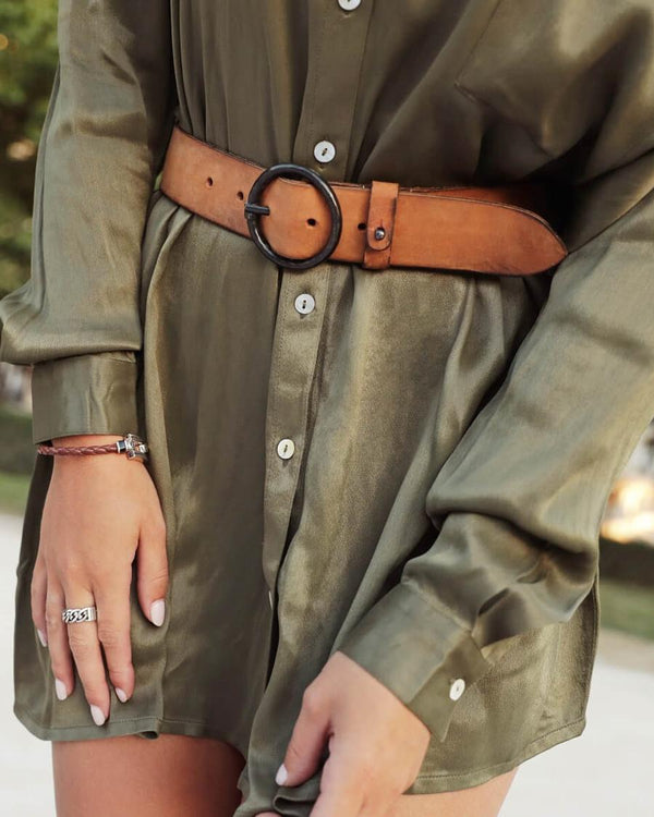 Cognac Pip belt over an olive satin shirt dress