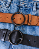 Pip leather belts in cognac and black, the set of 2, on denim
