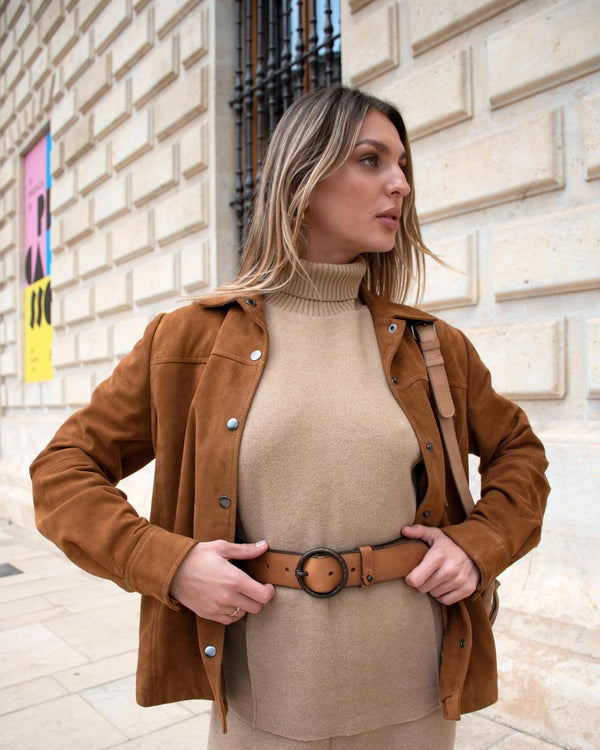 Cognac Pip belt over a camel turtleneck and suede jacket