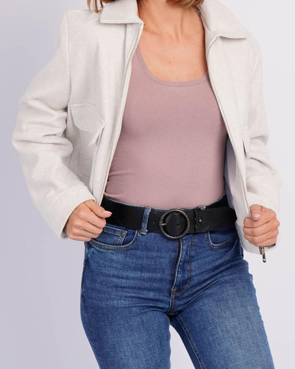Black Pip belt with a cream jacket and jeans