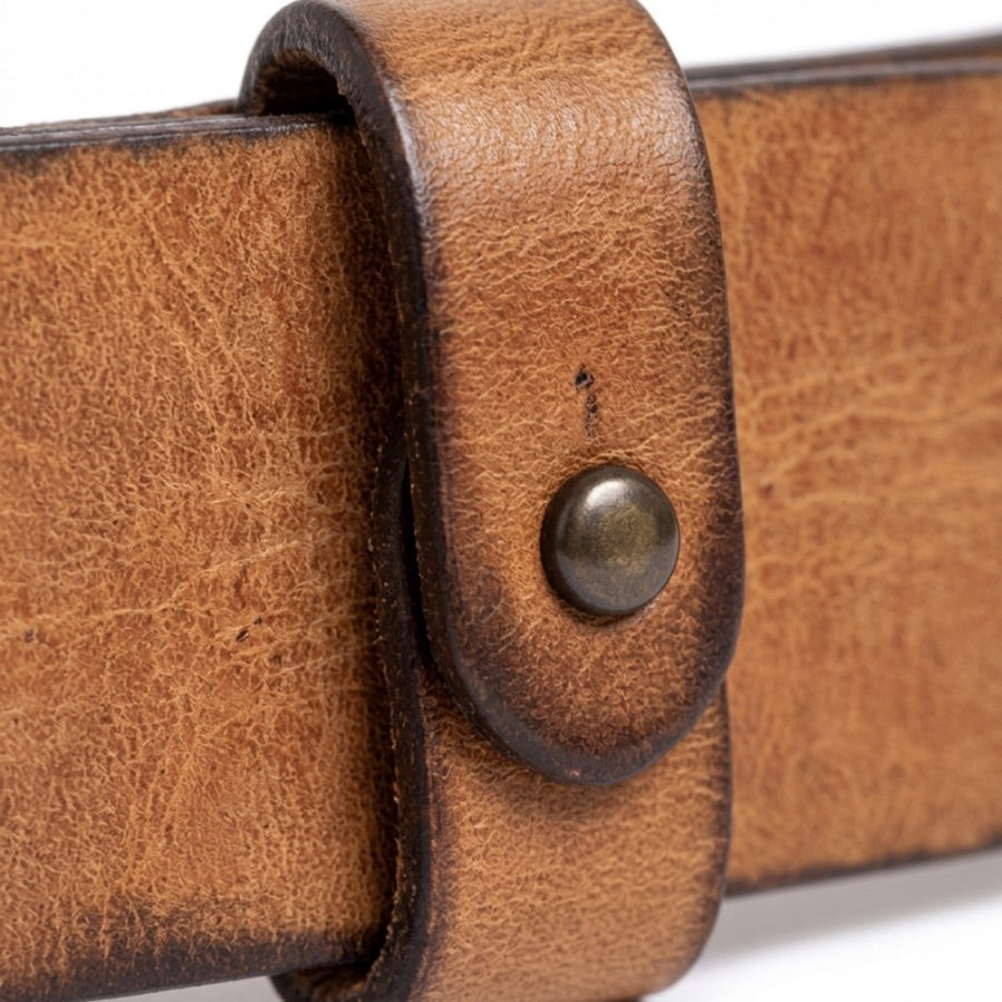 Close-up of the Pip's leather loop and metal rivet